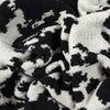 Wrangler Black & White Cowhide Stretchy Throw Blanket