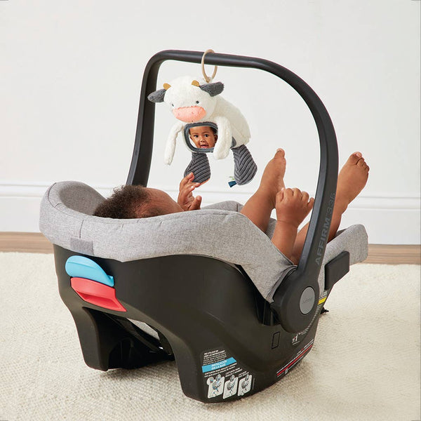 Itzy Ritzy Carmen The Cow - Itzy Bitzy Mirror™ Travel + Tummy Time Toy - Broken horn