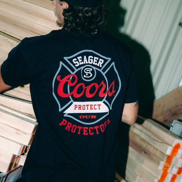 Seager x Coors Banquet Protectors Badge Tee Black - Broken horn
