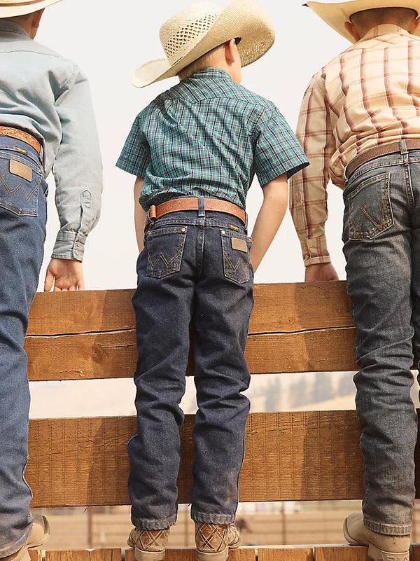 KONTOOR Wrangler Cowboy Cut boys' pre-washed indigo jeans in size 8-18, featuring classic Western style and durable denim fabric.