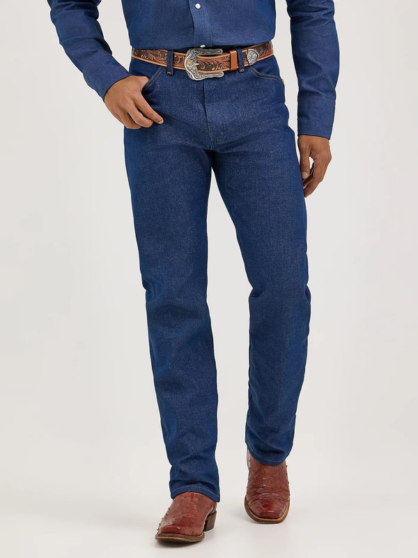 Men's Wrangler Cowboy Cut Original Fit Rigid Indigo jeans, denim fabric, classic stitching, and leather patch on waistband.