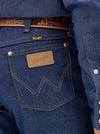 Men's Wrangler Cowboy Cut Original Fit Rigid Indigo jeans, denim fabric, classic Western style, front view.
