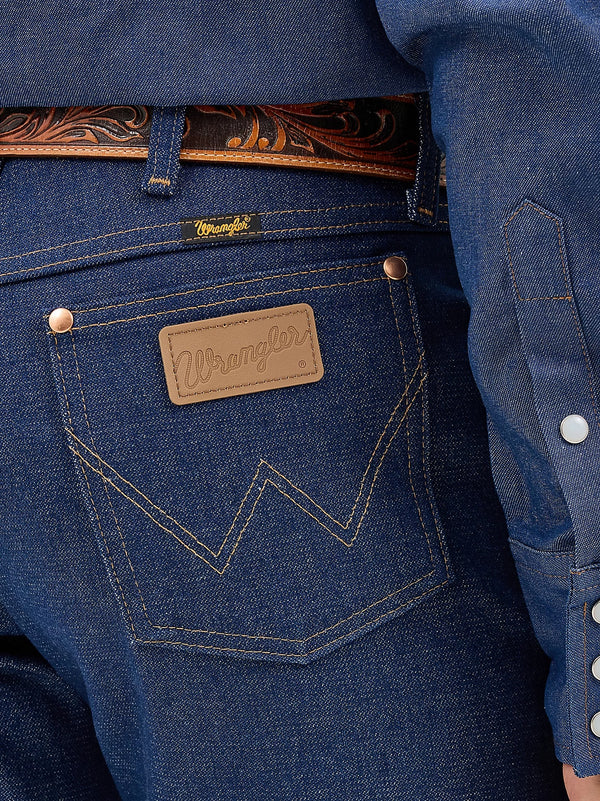 Men's Wrangler Cowboy Cut Original Fit Rigid Indigo jeans, denim fabric, classic Western style, front view.