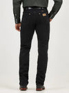 Men's Wrangler Cowboy Cut Original Fit jeans in Shadow Black by KONTOOR, featuring classic denim with a relaxed fit and sturdy stitching.