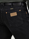 KONTOOR Wrangler men's cowboy cut jeans in shadow black, original fit with classic denim appearance and stitching details.