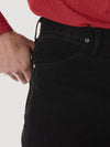 Men's Wrangler Cowboy Cut Silver Edition slim fit jeans in shadow black, featuring classic denim texture and branding details.