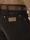 Men's Wrangler Cowboy Cut slim fit jeans in black chocolate, KONTOOR brand, showing the front view with classic style and stitching.