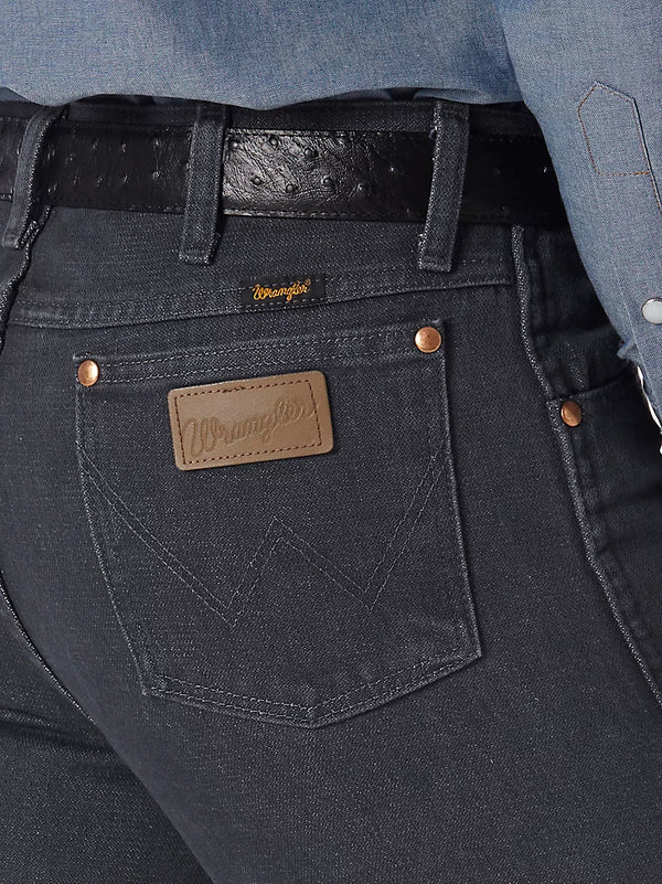 Men's Wrangler Cowboy Cut Slim Fit Jeans in charcoal grey by KONTOOR, showing the classic fit and fabric texture.