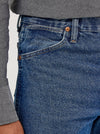 Men's Wrangler Cowboy Cut slim fit jeans in stonewash denim, featuring classic Western styling and durable construction.