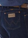 Men's Wrangler Cowboy Cut stretch slim fit navy jeans by KONTOOR, featuring classic denim style and modern slim silhouette.