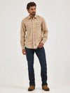 KONTOOR Wrangler men's retro slim fit jean with bootcut style in Dax wash, showcasing front view with classic denim details.