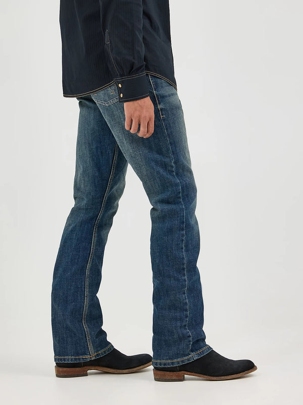KONTOOR Wrangler men's retro slim fit bootcut jeans in Layton wash, featuring classic denim style and tapered fit.