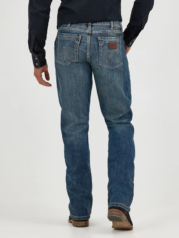 KONTOOR Wrangler men's retro slim fit bootcut jeans in Layton wash, showcasing classic denim with a modern fit and stylish design.