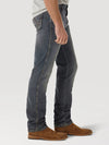 Men's Wrangler retro slim fit straight leg jeans in dark navy denim, shown on a model.