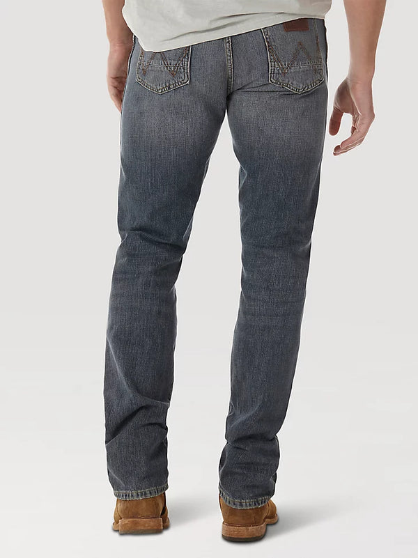 KONTOOR Wrangler men's retro slim fit straight leg jeans in dark knight wash, showcasing classic denim style and fit.