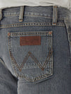 KONTOOR Wrangler men's retro slim fit straight leg jeans in dark knight denim, showcasing front view with classic five-pocket design.