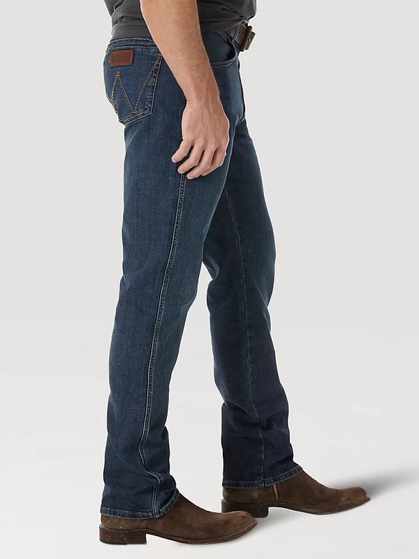 KONTOOR Wrangler men's retro slim fit straight leg jeans in Portland color, showing front view with classic denim texture.