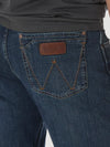 KONTOOR Wrangler men's retro slim fit straight leg jeans in Portland wash, displayed on a model against a neutral background.