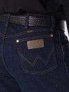 Men's Wrangler Cowboy Cut Stretch Regular Fit jeans in navy, KONTOOR brand, shown with front pockets and belt loops.