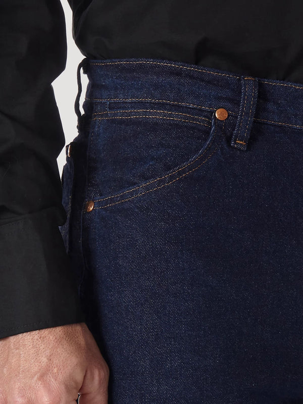 Men's Wrangler Cowboy Cut stretch regular fit jeans in navy, denim fabric with classic Western styling by KONTOOR.