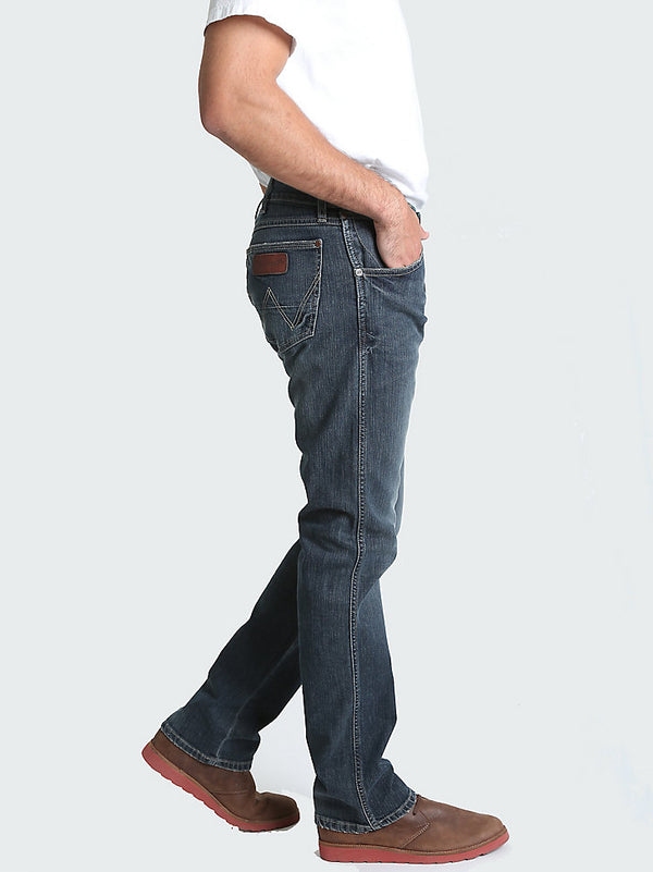 Men's Wrangler Retro Slim Fit Straight Leg Jeans by KONTOOR, showing classic denim fabric and tailored fit on a model.