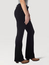 Women’s black Wrangler mid-rise jeans by KONTOOR, showing the fitted denim with classic stitching and five-pocket design.