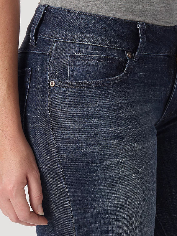 Women's Wrangler mid-rise jeans in DS wash by KONTOOR, featuring classic denim with a comfortable fit and stylish design.