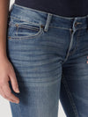 KONTOOR Wrangler Women Retro Mae Deadwood jeans with high-waisted fit and classic denim wash, styled on a model.