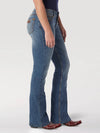 KONTOOR Wrangler Women Retro Mae Jean in KM Wash with mid-rise fit and classic denim design, shown in a stylish casual outfit.