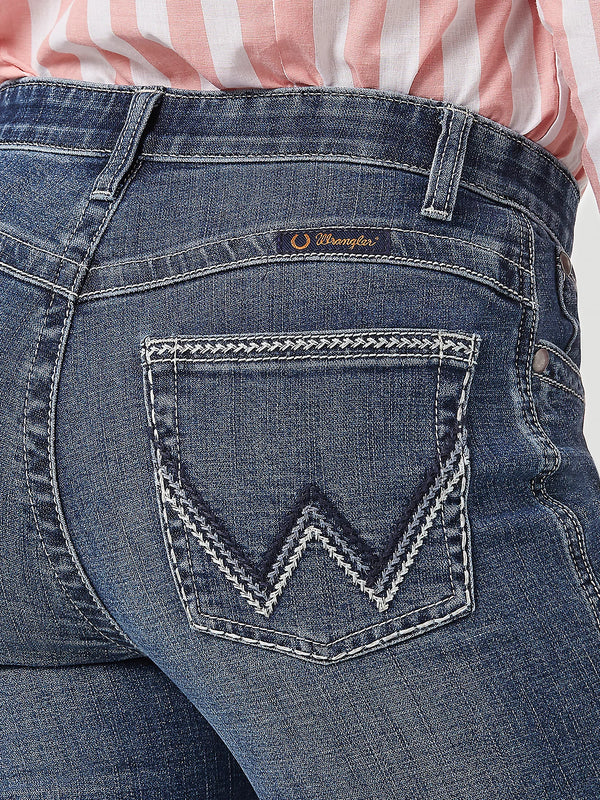 Women's Wrangler Willow Ultimate Riding Jean by KONTOOR, showing classic denim style with a fitted cut and functional pockets.
