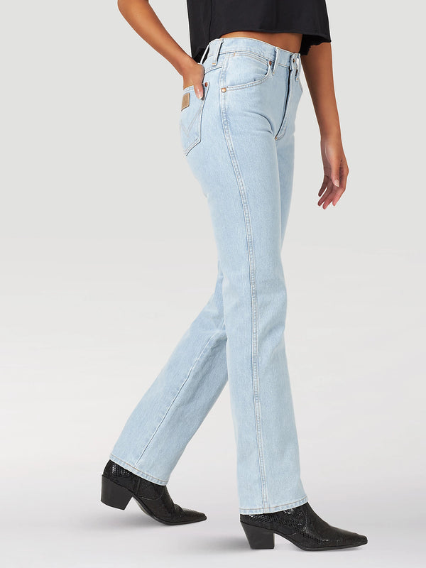KONTOOR Wrangler women’s cowboy cut slim fit jeans in bleach wash, featuring classic denim styling and a fitted silhouette.