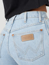 KONTOOR Wrangler Women's Cowboy Cut Slim Fit Bleach Jeans, showcasing light-wash denim with classic Western styling
