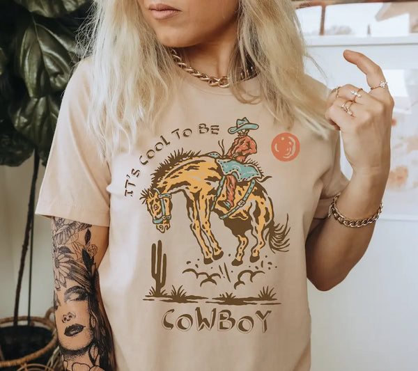 It's Cool To Be A Cowboy Tee - Tan - Broken horn